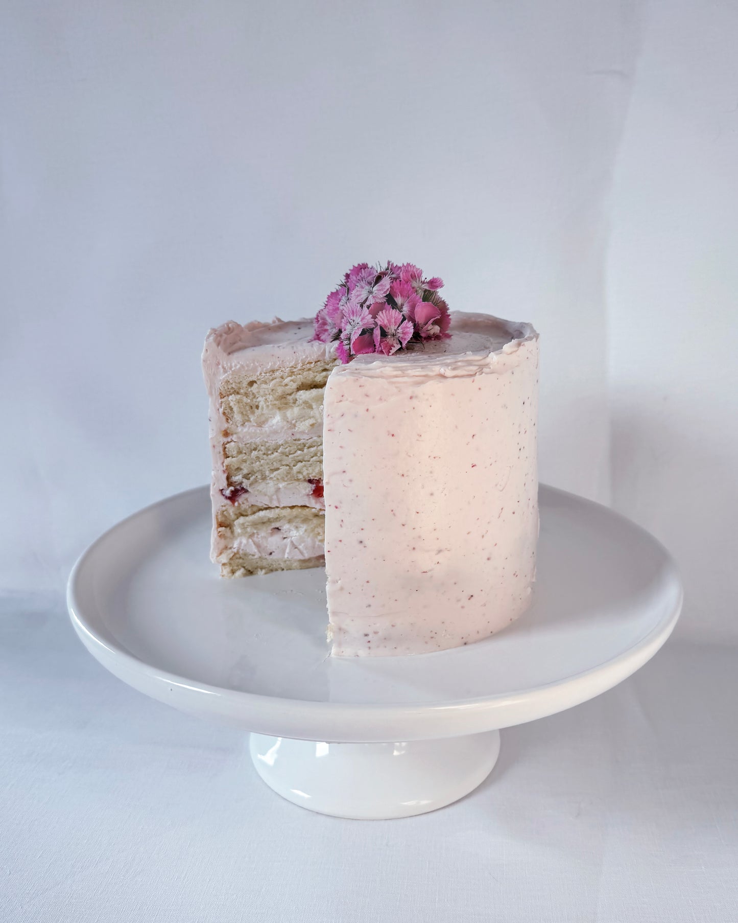 Strawberry garden cake with mascarpone buttercream and fresh strawberries