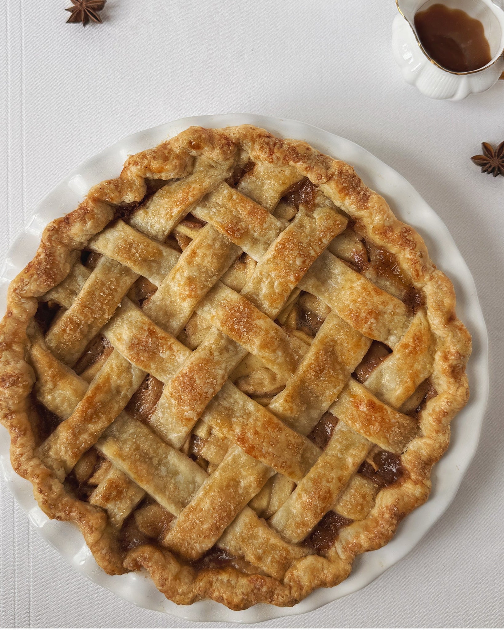 Salted caramel apple pie baked in a buttery, flaky crust by Sunday Crust