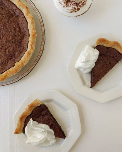 Chocolate chess pie with whipped cream 