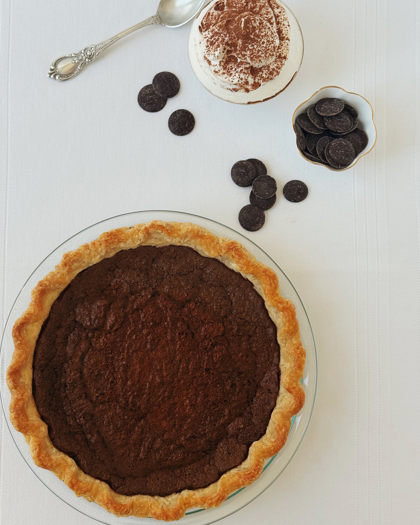 Whole chocolate chess pie made with Guittard bittersweet chocolate and Dutch process cocoa in a butter crust
